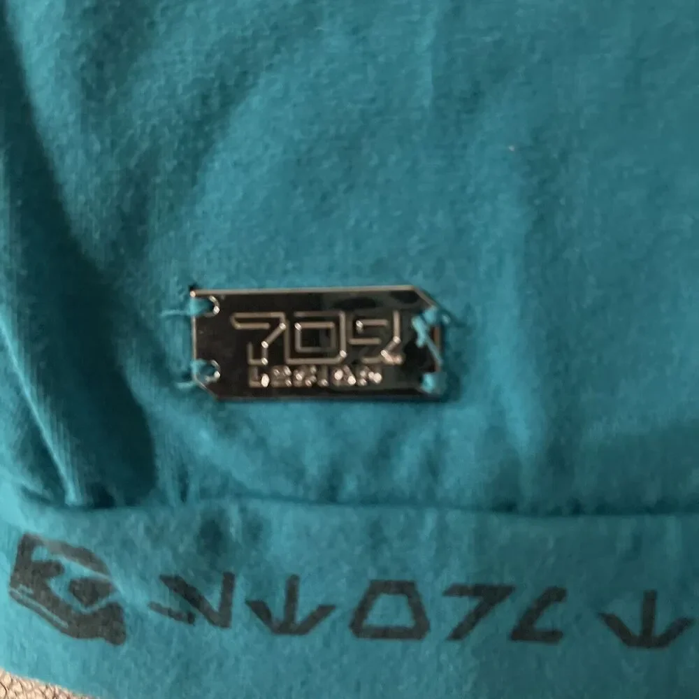 Star Wars Galaxy’s Edge kids Size extra large Turquoise Short Sleeve Shirt